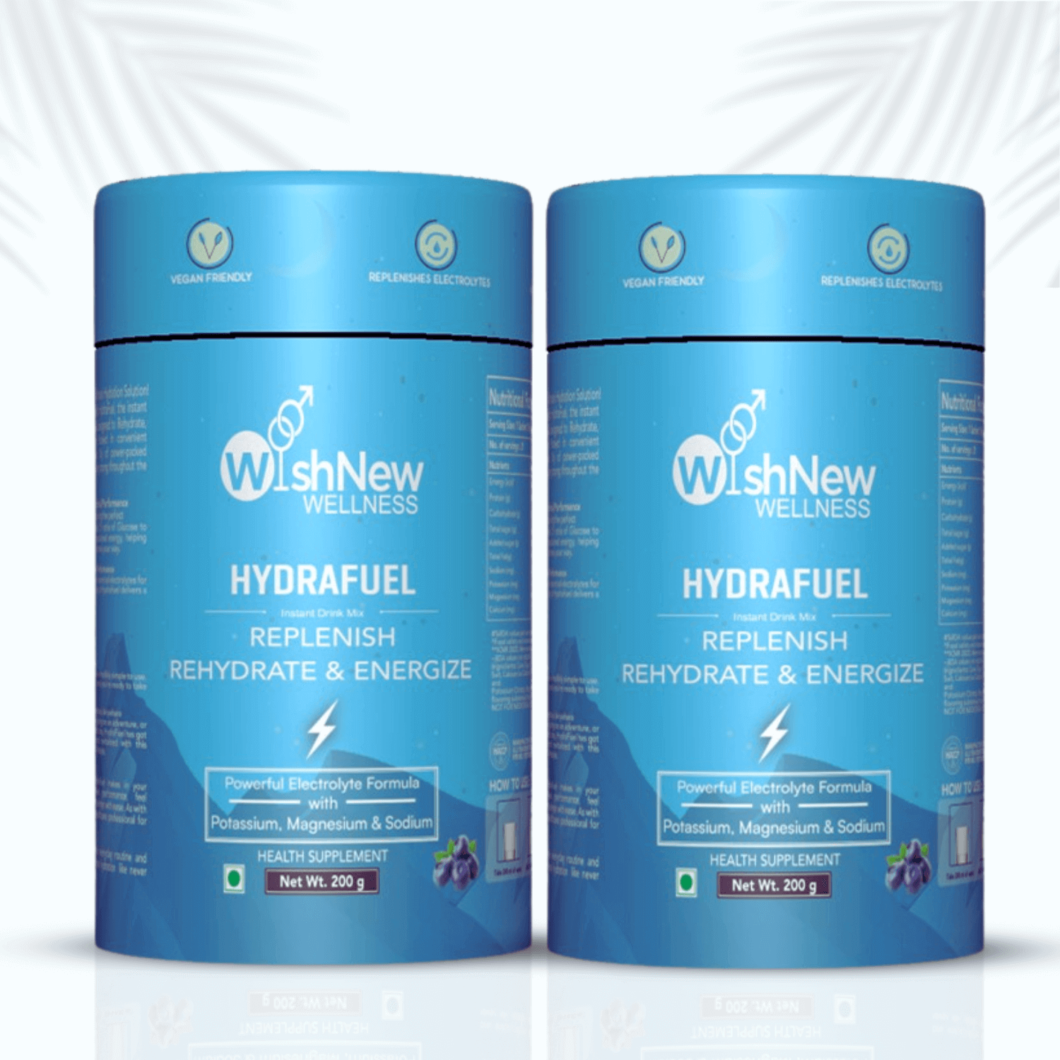 A product image featuring two blue containers of Hydrafuel by WishNew Wellness placed side by side. The label highlights "Replenish, Rehydrate & Energize" with details such as "Powerful Electrolyte Formula with Potassium, Magnesium & Sodium." The packaging also displays icons for "Vegan Friendly" and "Replenishes Electrolytes," along with a depiction of blueberries indicating flavor. The background is light with subtle leaf patterns, adding a natural touch to the presentation.