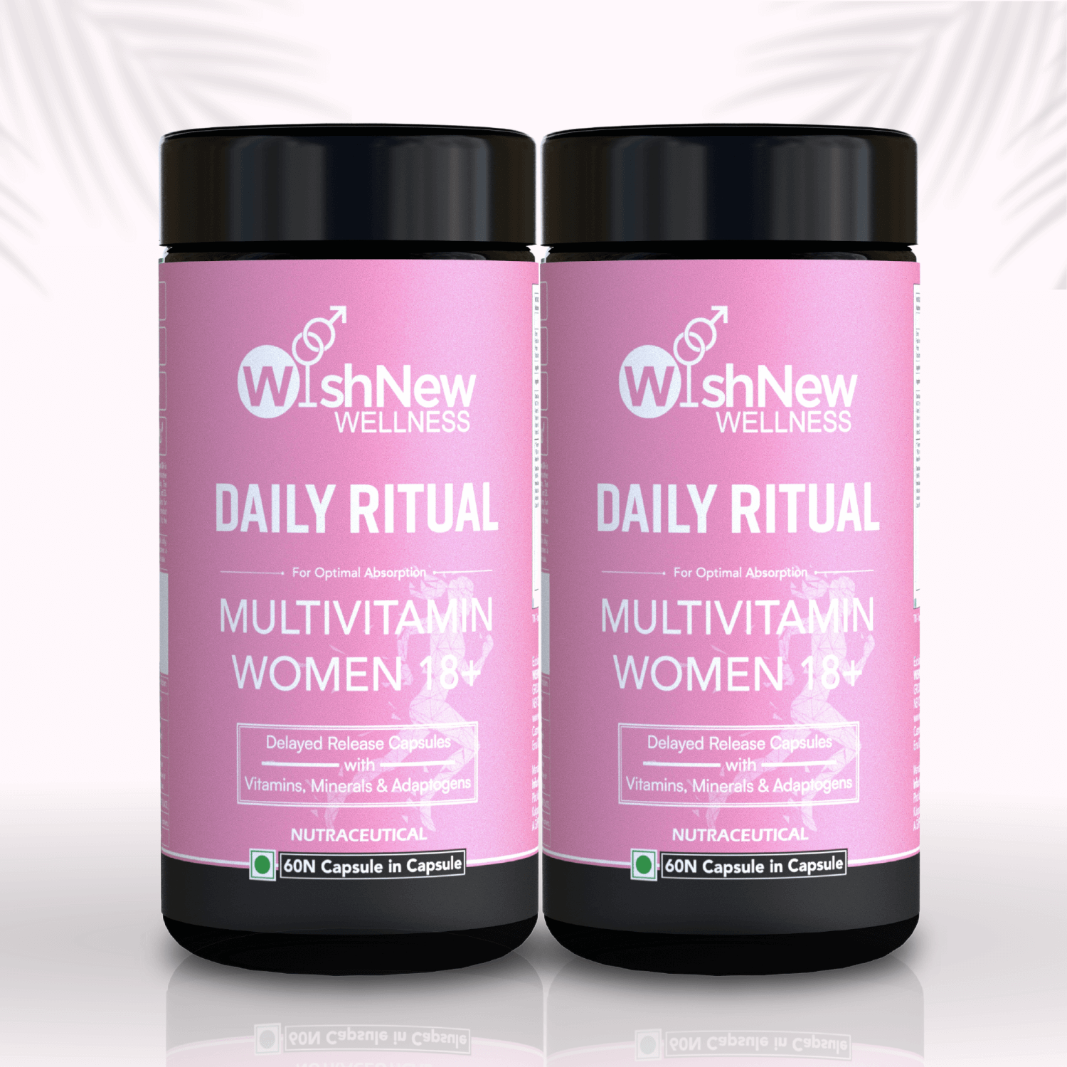 Two bottles of WishNew Wellness Daily Ritual Multivitamin Women 18+, featuring delayed-release capsules for optimal absorption of vitamins, minerals, and adaptogens.