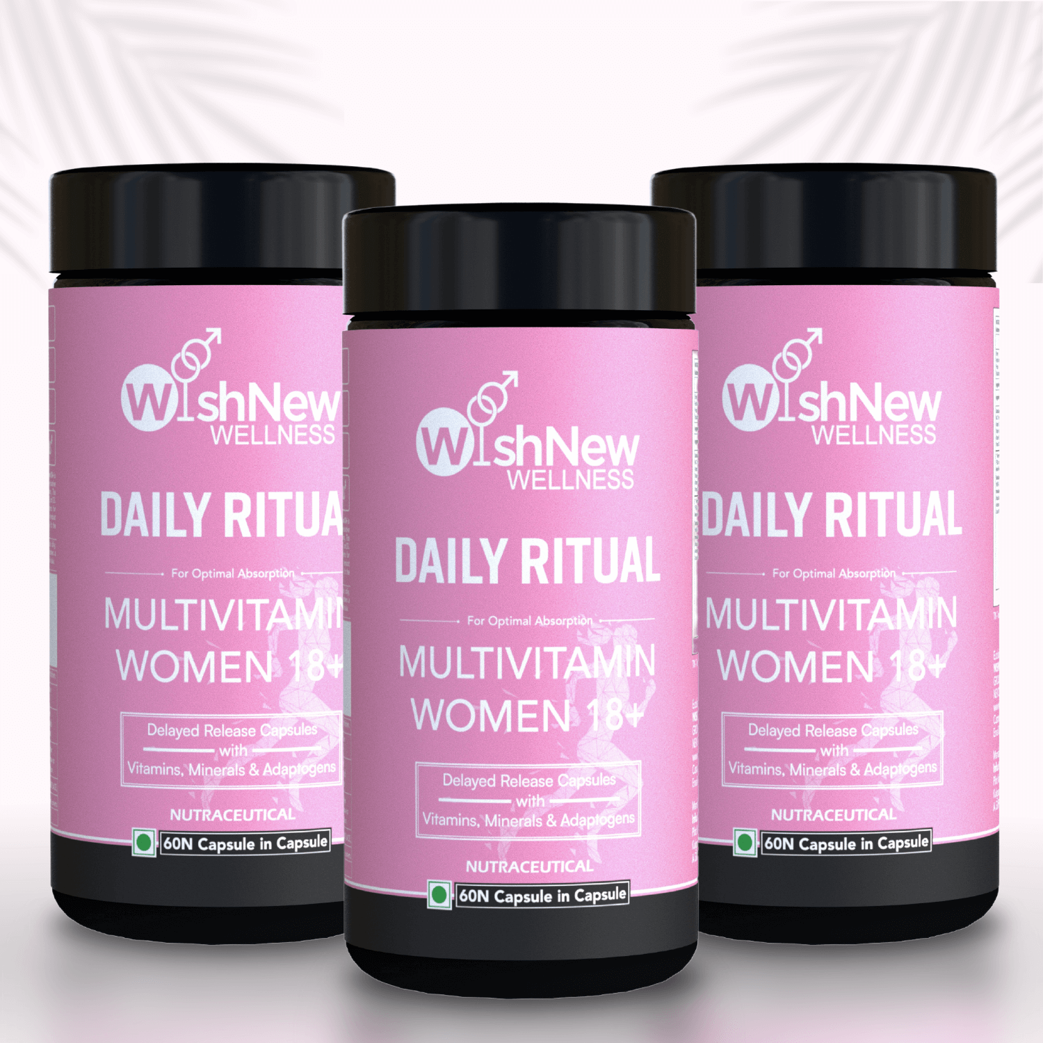 Three bottles of WishNew Wellness Daily Ritual Multivitamin Women 18+, featuring delayed-release capsules for optimal absorption of essential vitamins, minerals, and adaptogens.