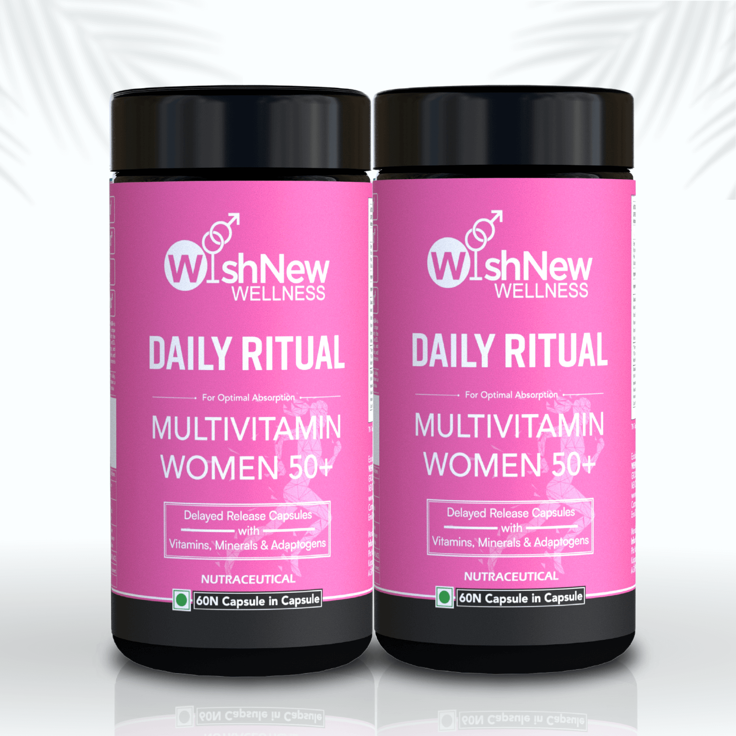 Two bottles of WishNew Wellness Daily Ritual Multivitamin Women 50+, featuring delayed-release capsules for optimal absorption of vitamins, minerals, and adaptogens.