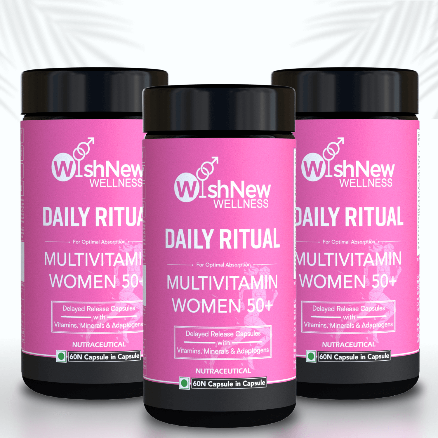 Three bottles of WishNew Wellness Daily Ritual Multivitamin Women 50+, featuring delayed-release capsules for optimal absorption of essential vitamins, minerals, and adaptogens.